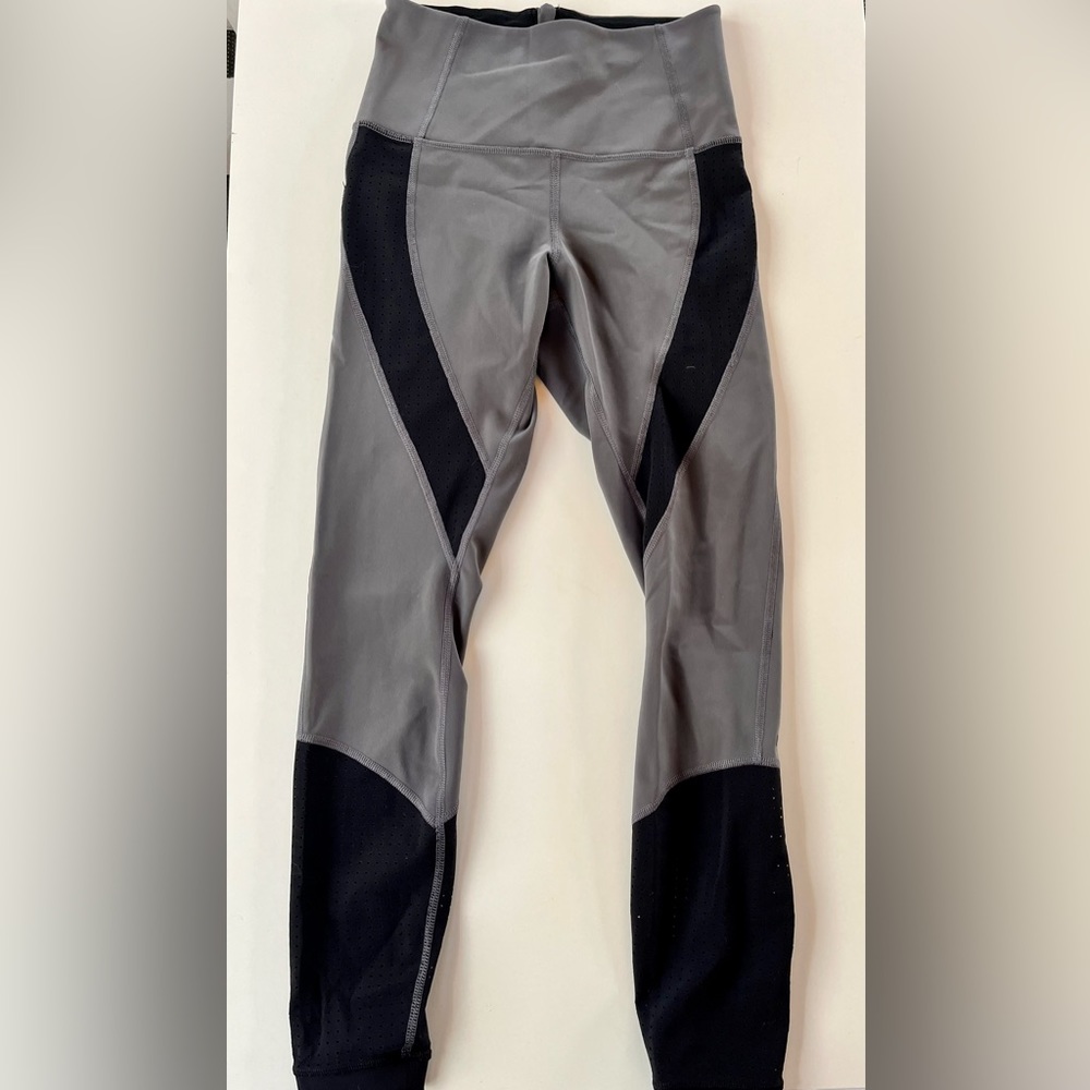 Lululemon purple-y grey and black leggings.